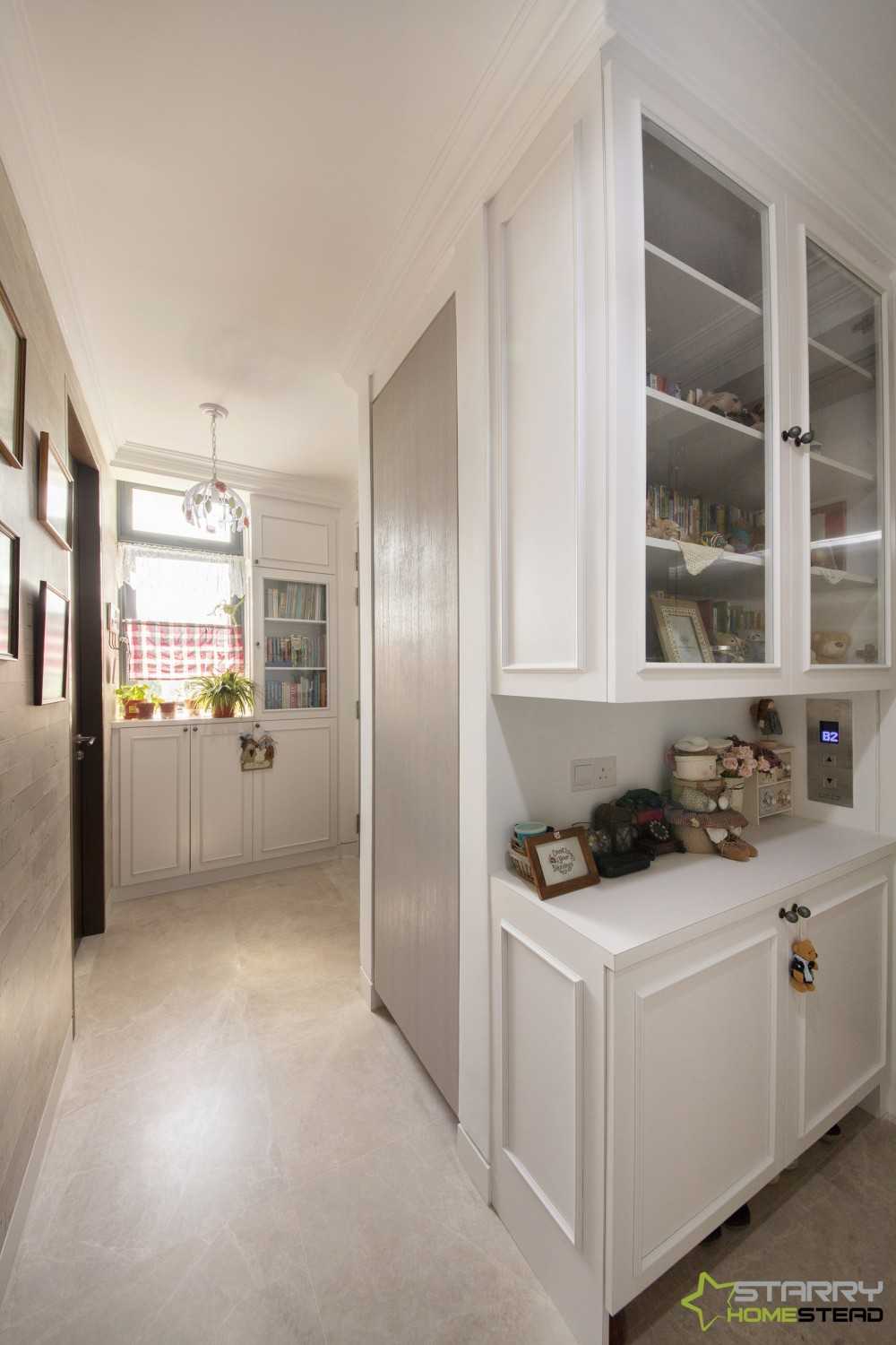Country Entryway with Small Storage and Display Cabinets