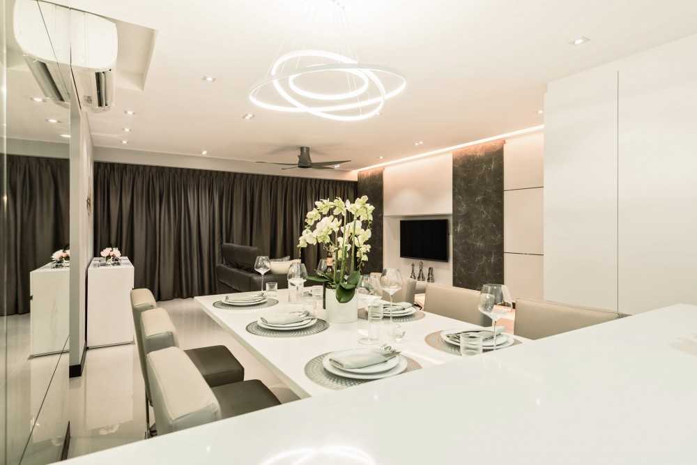 Modern Dining Room with Cove Lighting and Chandelier