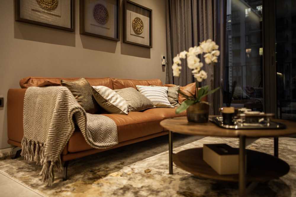 Asian Living Room with TV Console and Chandelier