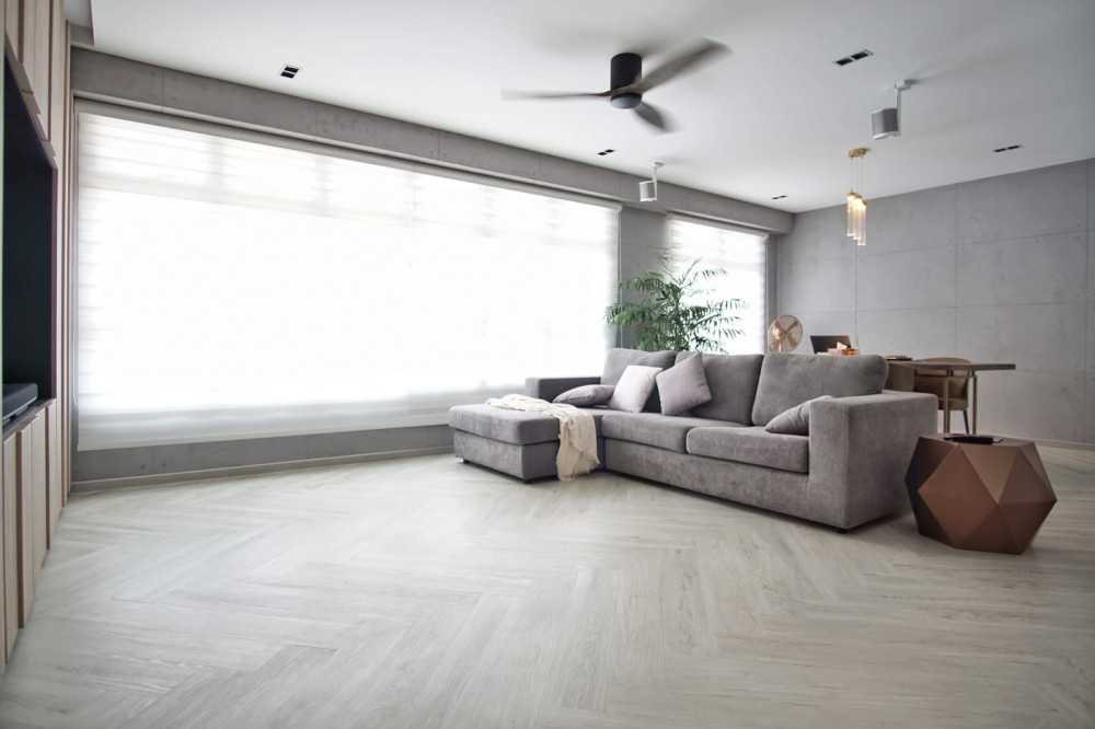 Minimalist Living Room with Homogeneous Tiles and Drop Light