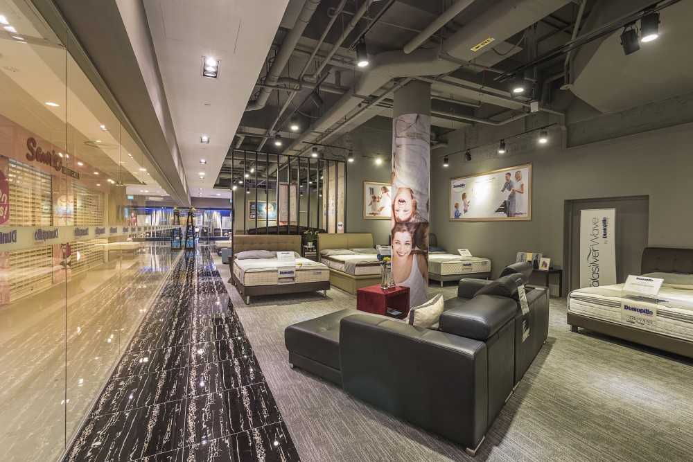 Industrial Showroom with Homogeneous Tiles and Feature Wall